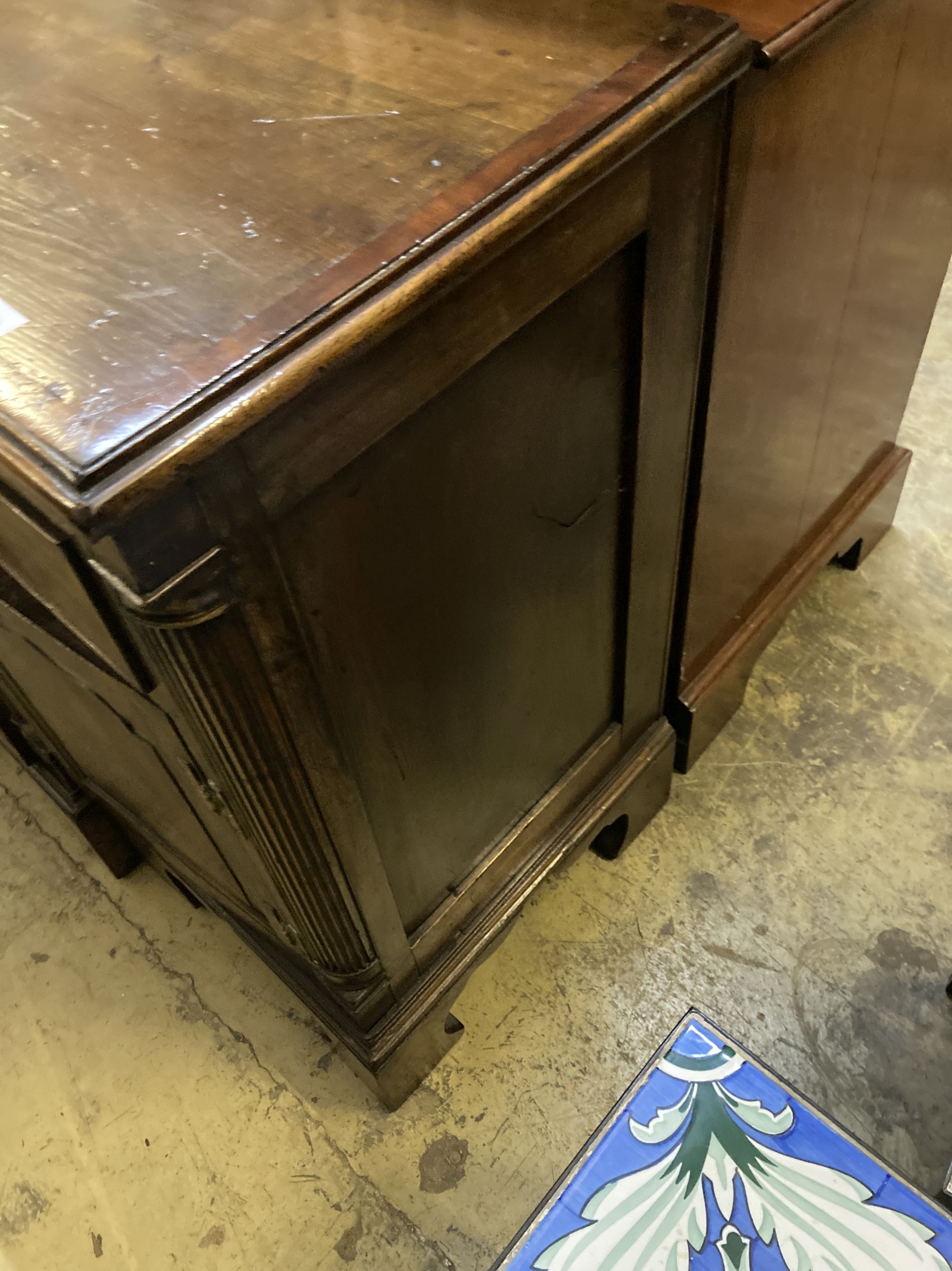 A George III style cross banded oak break front low dresser, width 50cm, depth 47cm, height 83cm